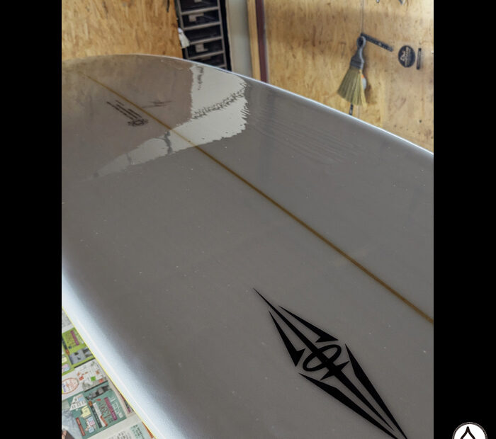 ATOM Surfboard bottom finish coatd
